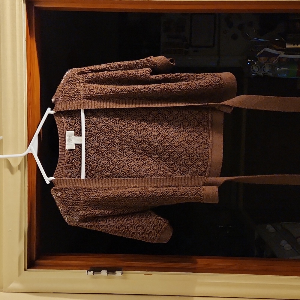 Ann Taylor Loft short sleeve crocheted sweater with ties, size medium.